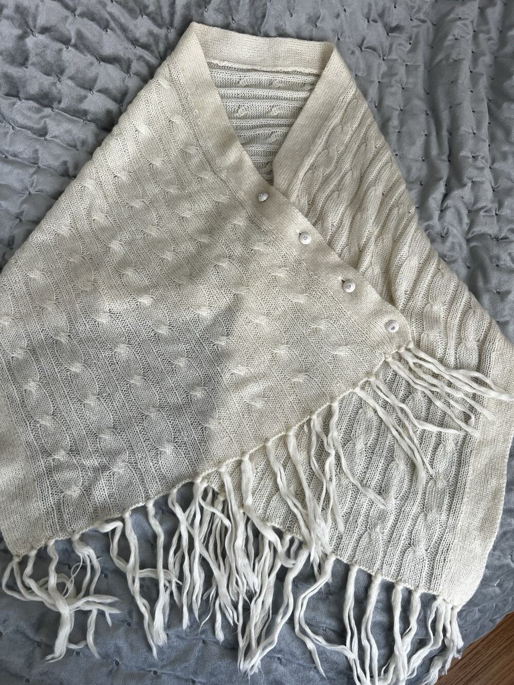 Cashmere creamy-white knit open-front poncho cape with fringes and buttons